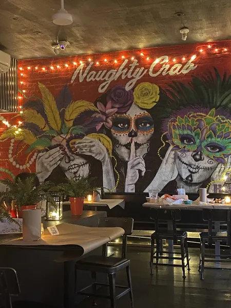 Dining ambiance of restaurant Naughty Crab 1