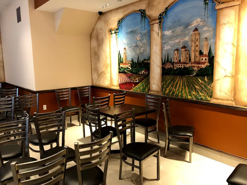 Dining ambiance of restaurant Italian Village Pizza 1