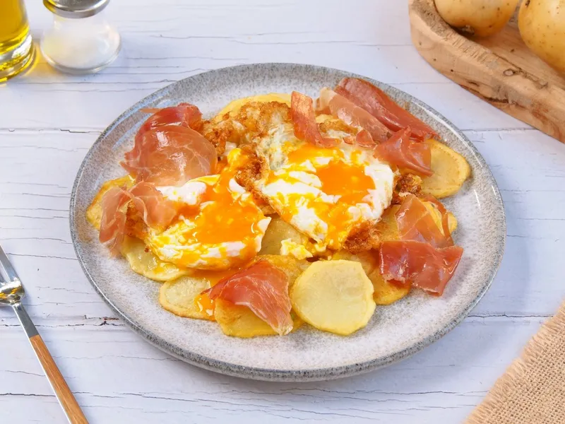 Huevos estrellados o rotos Oliva Tapas Españolas