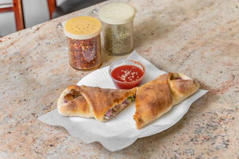 Meat Lovers Calzone Taste of Italy Restaurant & Pizzeria NYC